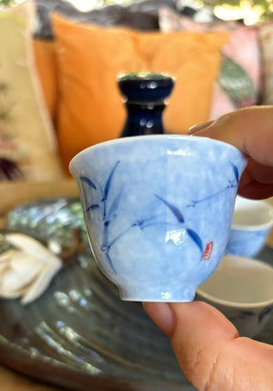 My House by Marine vintage Sake Set Porcelain Sake Set: Blue Bottle, 4 Delicate Hand Painted Floral Cups, Woven Basket