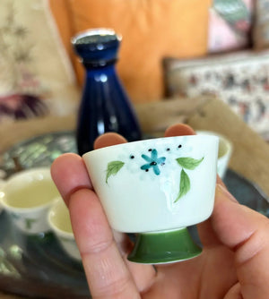 My House by Marine vintage Sake Set Porcelain Sake Set: Blue Bottle, 4 Delicate Hand Painted Floral Cups, Woven Basket